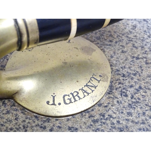 1344 - A Scottish granite curling stone with handle to centre stamped J Grant Leeds. Approx. 11