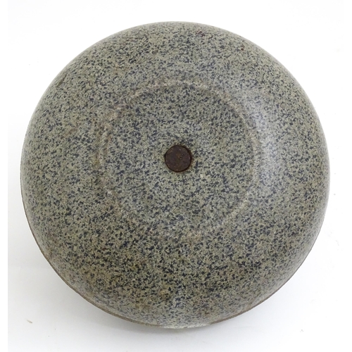 1344 - A Scottish granite curling stone with handle to centre stamped J Grant Leeds. Approx. 11