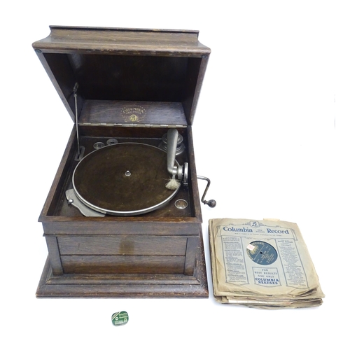 1345 - A mid 20thC Columbia 'Grafonola' phonograph, in oak case (approx 19 1/2