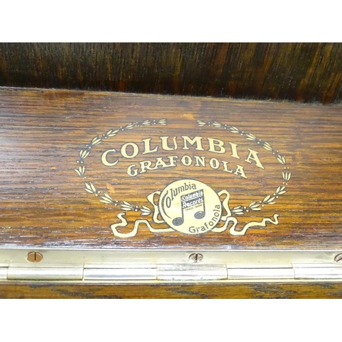 1345 - A mid 20thC Columbia 'Grafonola' phonograph, in oak case (approx 19 1/2