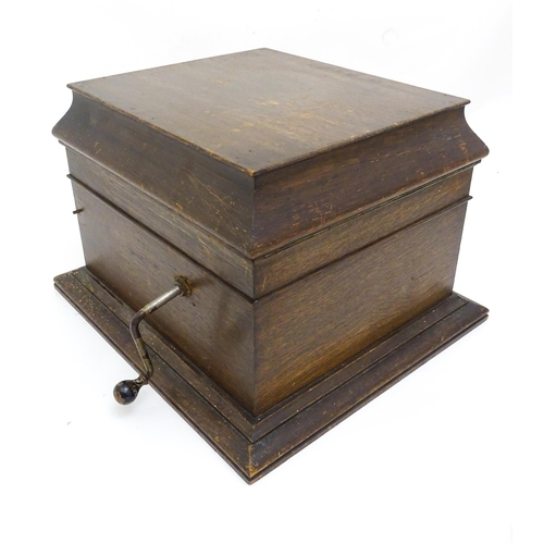 1345 - A mid 20thC Columbia 'Grafonola' phonograph, in oak case (approx 19 1/2