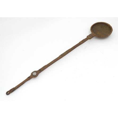 1347 - A blacksmith made wrought ladle  / long handled spoon with incised and punch detail.  Approx 35