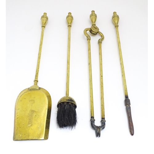 1368 - Victorian brass fire tools comprising tongs, poker, brush and shovel. The shovel approx 21