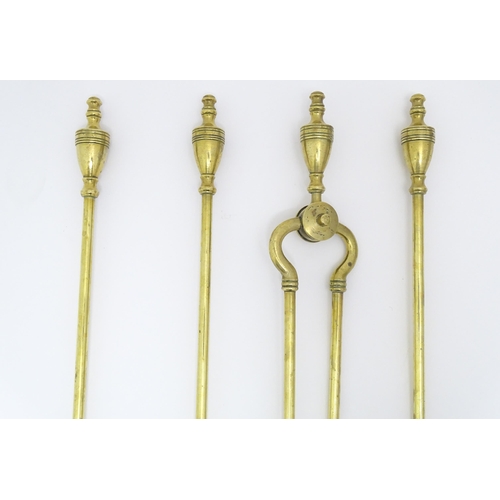 1368 - Victorian brass fire tools comprising tongs, poker, brush and shovel. The shovel approx 21