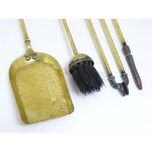 1368 - Victorian brass fire tools comprising tongs, poker, brush and shovel. The shovel approx 21