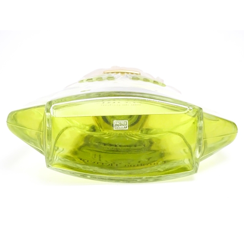 1370 - A large / oversized shop display advertising perfume bottle for Flore by Carolina Herrera. Approx. 1... 