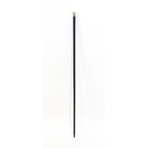 1409 - Stick / Cane : An ebonised walking cane with silver handle hallmarked London 1920. Approx. 35 1/2