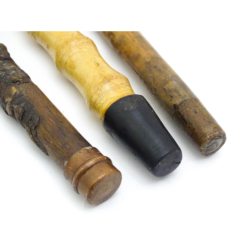 1411 - Sticks / Canes : Four assorted walking stick / canes to include an example with carved Oriental deco... 