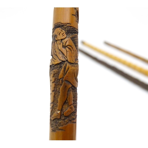 1411 - Sticks / Canes : Four assorted walking stick / canes to include an example with carved Oriental deco... 