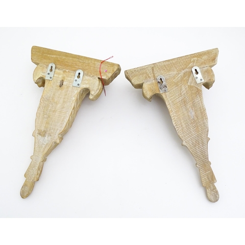 1659 - A pair of mid 20thC corbels / wall brackets with moulded tops above acanthus carved underrides. 10 1... 