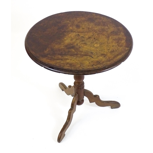 1722 - A 18thC and later tripod table, with a circular moulded burr top above a later birdcage movement, tu... 