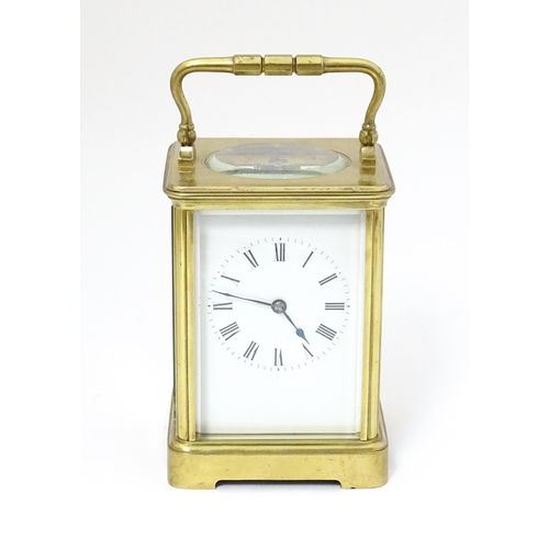 1536 - A late 19th / early 20thC French brass corniche cased carriage clock, by Richard & Cie. Having ename... 