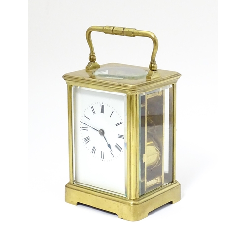 1536 - A late 19th / early 20thC French brass corniche cased carriage clock, by Richard & Cie. Having ename... 