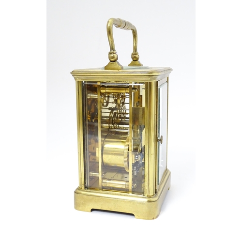 1536 - A late 19th / early 20thC French brass corniche cased carriage clock, by Richard & Cie. Having ename... 