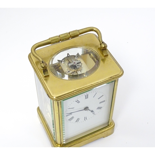 1536 - A late 19th / early 20thC French brass corniche cased carriage clock, by Richard & Cie. Having ename... 