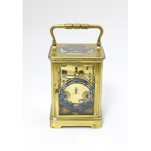 1536 - A late 19th / early 20thC French brass corniche cased carriage clock, by Richard & Cie. Having ename... 