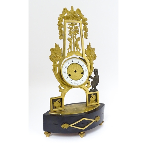 1541 - A 19thC empire style mantle clock with ormolu stylised lyre surround decorated with fruit and foliat... 