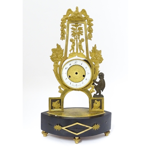 1541 - A 19thC empire style mantle clock with ormolu stylised lyre surround decorated with fruit and foliat... 