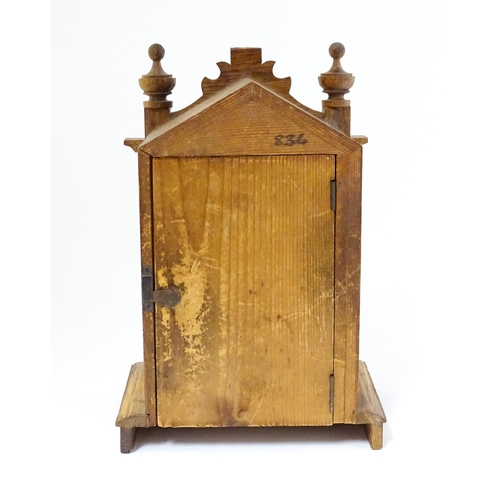 1547 - An oak mantel clock with cuckoo to top. Approx 9 1/2