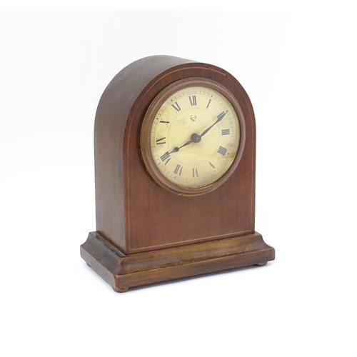 1548A - An early 20thC Continental mahogany mantle clock the dial and movement marked with Oil lamp trademar... 