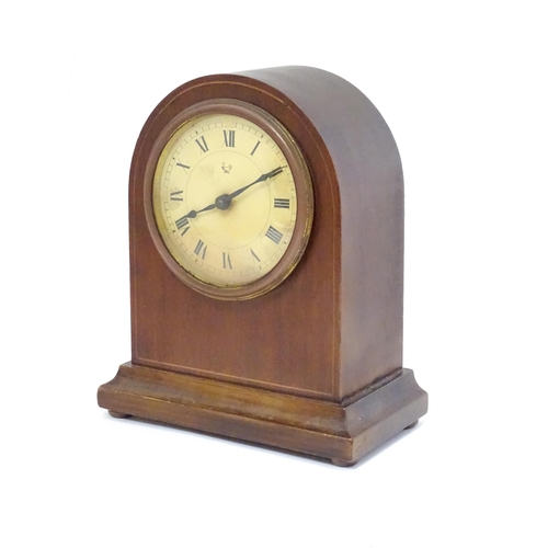 1548A - An early 20thC Continental mahogany mantle clock the dial and movement marked with Oil lamp trademar... 