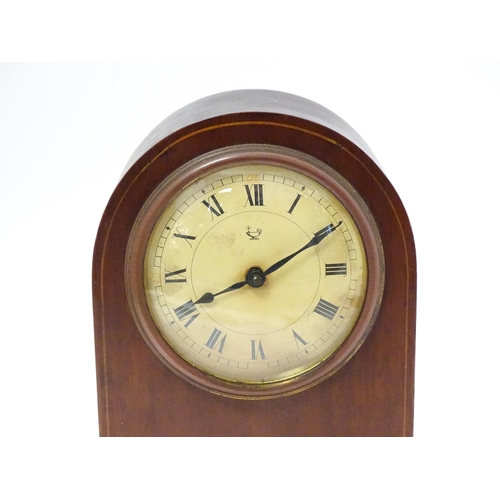 1548A - An early 20thC Continental mahogany mantle clock the dial and movement marked with Oil lamp trademar... 