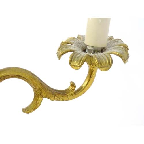 1561 - A four branch gilt metal pendant electrolier / light with acanthus detail. Approx. 25