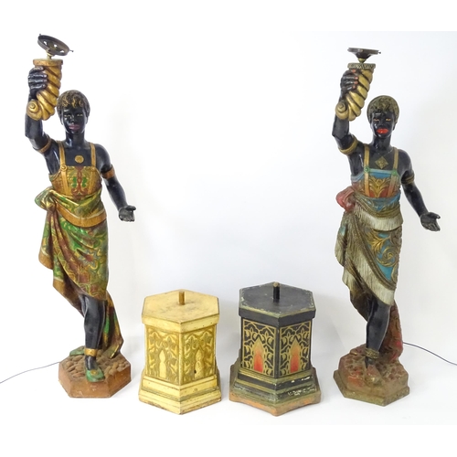 1589 - Two mid 20thC blackamoor lamps, the lamps having a polychrome figural top grasping a torchiere, the ... 