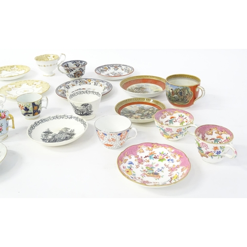 227 - A quantity of assorted cups and saucers / trios, to include examples by Spode, Minton, Davenport, et... 