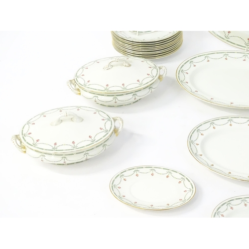 245 - A quantity of Royal Doulton dinner wares in the Sibyl pattern to include plates, lidded tureen, sauc... 