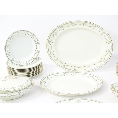 245 - A quantity of Royal Doulton dinner wares in the Sibyl pattern to include plates, lidded tureen, sauc... 