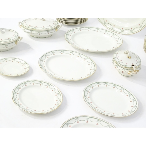 245 - A quantity of Royal Doulton dinner wares in the Sibyl pattern to include plates, lidded tureen, sauc... 