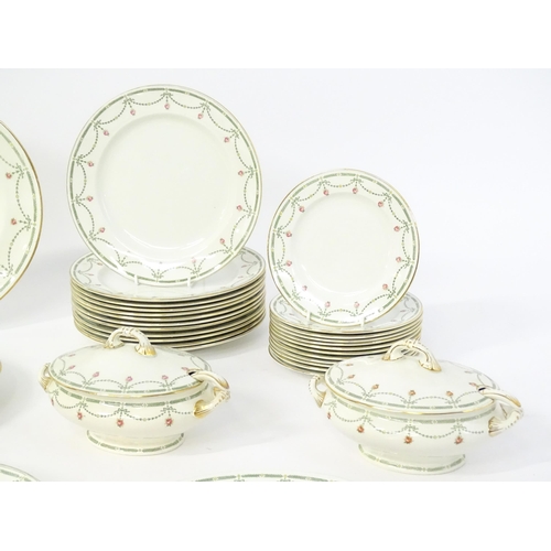 245 - A quantity of Royal Doulton dinner wares in the Sibyl pattern to include plates, lidded tureen, sauc... 