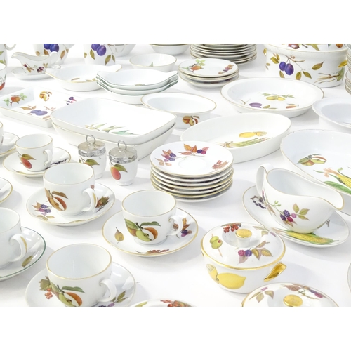 247 - A large quantity of Royal Worcester dinner / tea wares in the Evesham pattern to include plates, bow... 