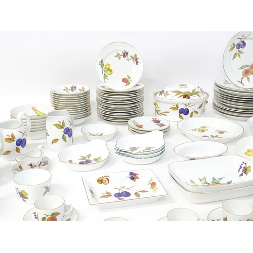 247 - A large quantity of Royal Worcester dinner / tea wares in the Evesham pattern to include plates, bow... 