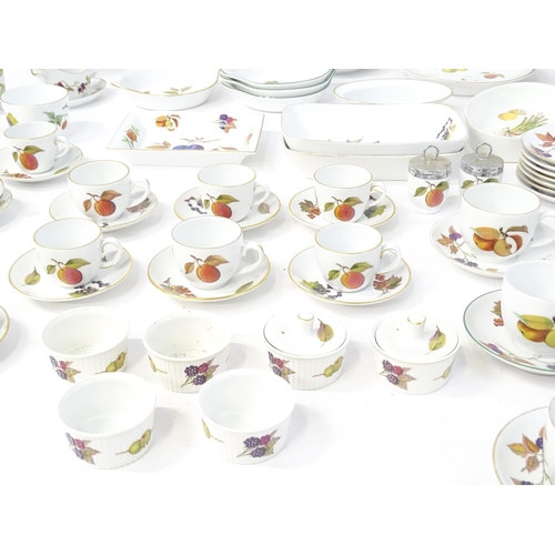 247 - A large quantity of Royal Worcester dinner / tea wares in the Evesham pattern to include plates, bow... 