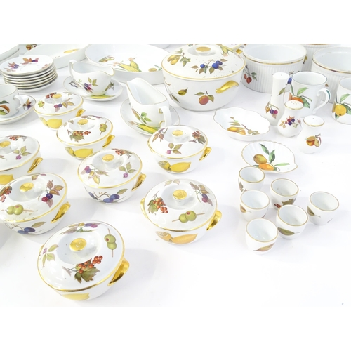 247 - A large quantity of Royal Worcester dinner / tea wares in the Evesham pattern to include plates, bow... 