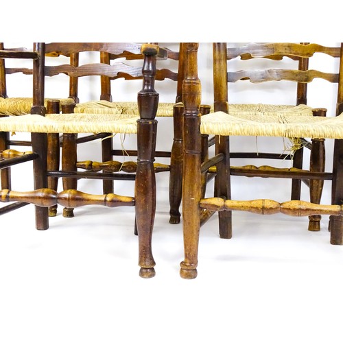 1716 - A group of six envelope seated ladderback chairs (4+2) raised on turned tapering front legs terminat... 