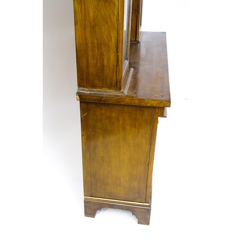 1728 - An early 20thC oak and burr walnut veneered dresser with a moulded cornice over two glazed cupboards... 