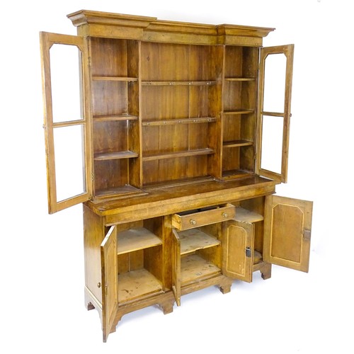 1728 - An early 20thC oak and burr walnut veneered dresser with a moulded cornice over two glazed cupboards... 