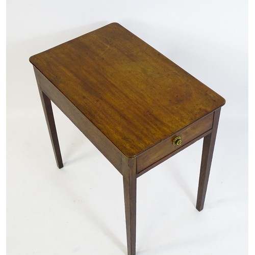 1666 - An early 19thC mahogany side table with a single short drawer to one end and raised on four tapering... 