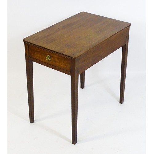 1666 - An early 19thC mahogany side table with a single short drawer to one end and raised on four tapering... 