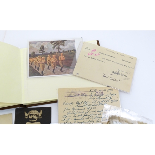 2222 - Two modern photograph albums, together with a quantity of postcards, including a WWII German telegra... 