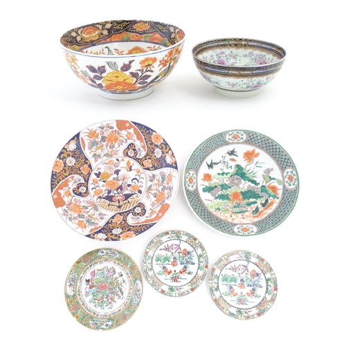 243 - A quantity of assorted Oriental ceramics to include a Japanese charger decorated in the Imari palett... 