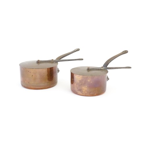 1203 - Two French Villedieu copper pans and lids with iron handles. Stamped to side. Largest approx. 14 1/2... 