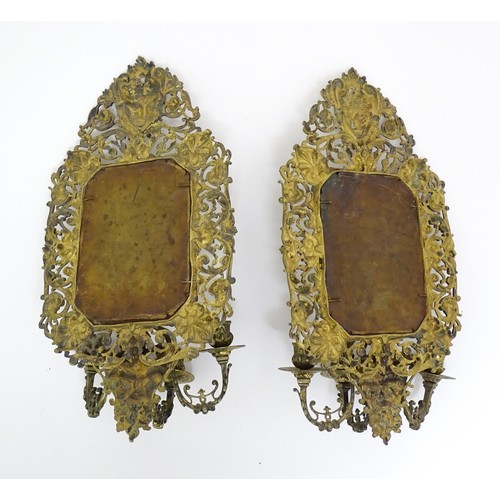 1637 - A pair of 20thC brass Girandoles with central bevelled mirror and three branch candle sconces. Appro... 