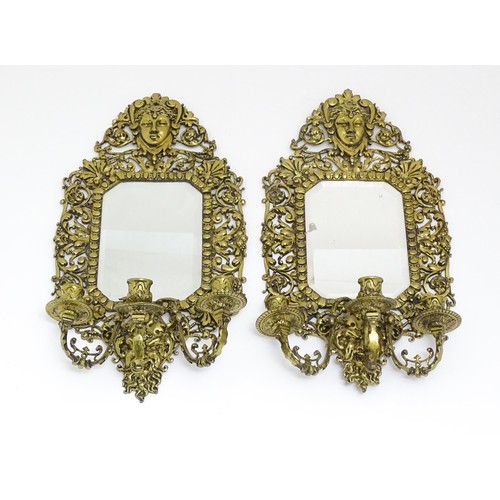 1637 - A pair of 20thC brass Girandoles with central bevelled mirror and three branch candle sconces. Appro... 