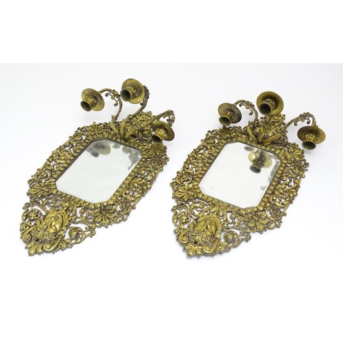 1637 - A pair of 20thC brass Girandoles with central bevelled mirror and three branch candle sconces. Appro... 