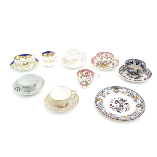 227 - A quantity of assorted cups and saucers / trios, to include examples by Spode, Minton, Davenport, et... 