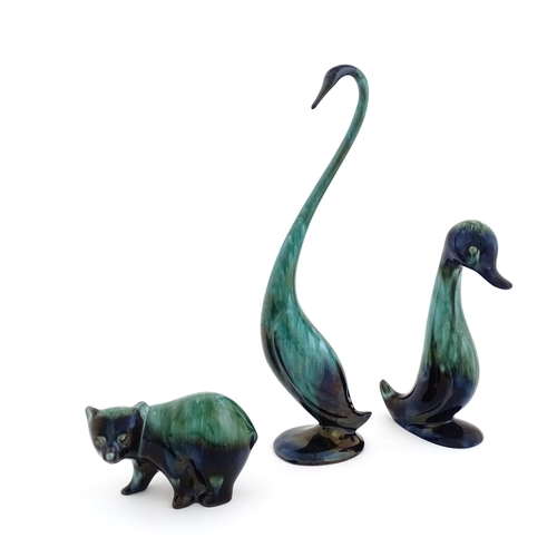 48 - Three Blue Mountain pottery animal figures with a high fired glaze comprising bear, duck, and goose.... 